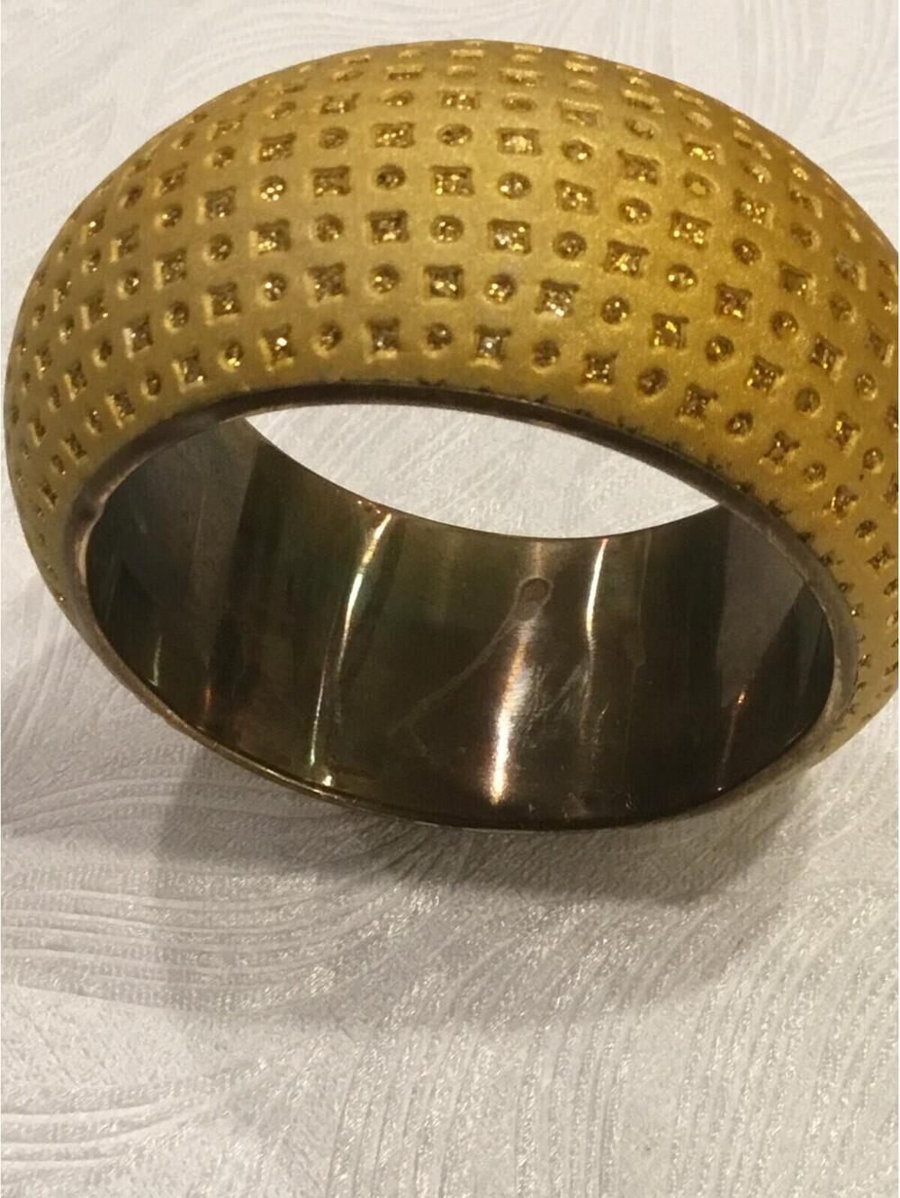 Vintage and Rare Brass Yellow Puffy Fabric Bangle with Gold Square and Circle Ac